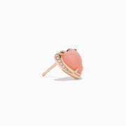 The 14K Rose Gold Pink Opal and Diamond Heart Stud Earrings feature pink heart-shaped centers accented with sparkling diamonds, shown on a white background.