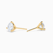Lab Grown Diamond 2.00ct Stud Earrings set in 14K yellow gold feature round, clear stones and are displayed against a plain white background.