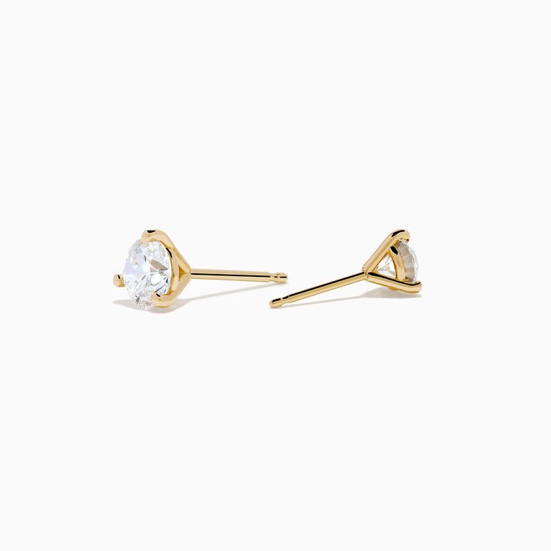 A pair of Lab Grown Diamond 1.00ct Stud Earrings in 14K Yellow Gold, each showcasing a single round-cut diamond, displayed on a plain white background.
