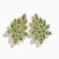 Make a statement with these ornate 14K Yellow Gold French Clip Emerald and Diamond Earrings (2.95 TCW), featuring a floral design with marquise emeralds and sparkling diamonds arranged in a symmetrical pattern.