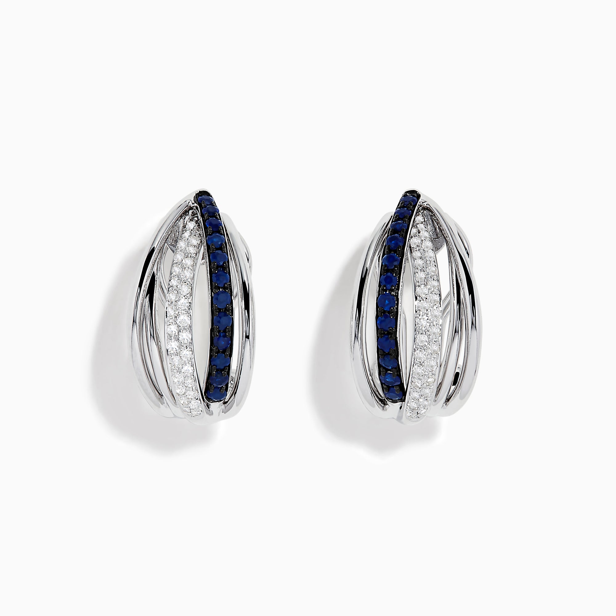 The Royale Bleu 14K White Gold Blue Sapphire & Diamond Earrings (0.62 TCW) feature intersecting bands—one adorned with white diamonds, the other with blue sapphires—shown on a white background.