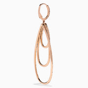 The 14K Rose Gold Espresso, Black, and White Diamond Cascading Teardrop Statement Earrings feature layered loops with alternating diamonds, recalling diamond teardrop elegance on a white background.