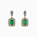 14K Yellow Gold Emerald and Diamond Drop Earrings, 2.51 TCW, featuring rectangular green emeralds framed by two rows of sparkling diamonds in a yellow gold and black metal setting.