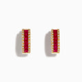 Ruby Royal 14K yellow gold 5/8 hoop earrings feature a row of princess cut rubies (1.76 TCW) in the center, bordered by small white diamonds on each side, set against a white background.