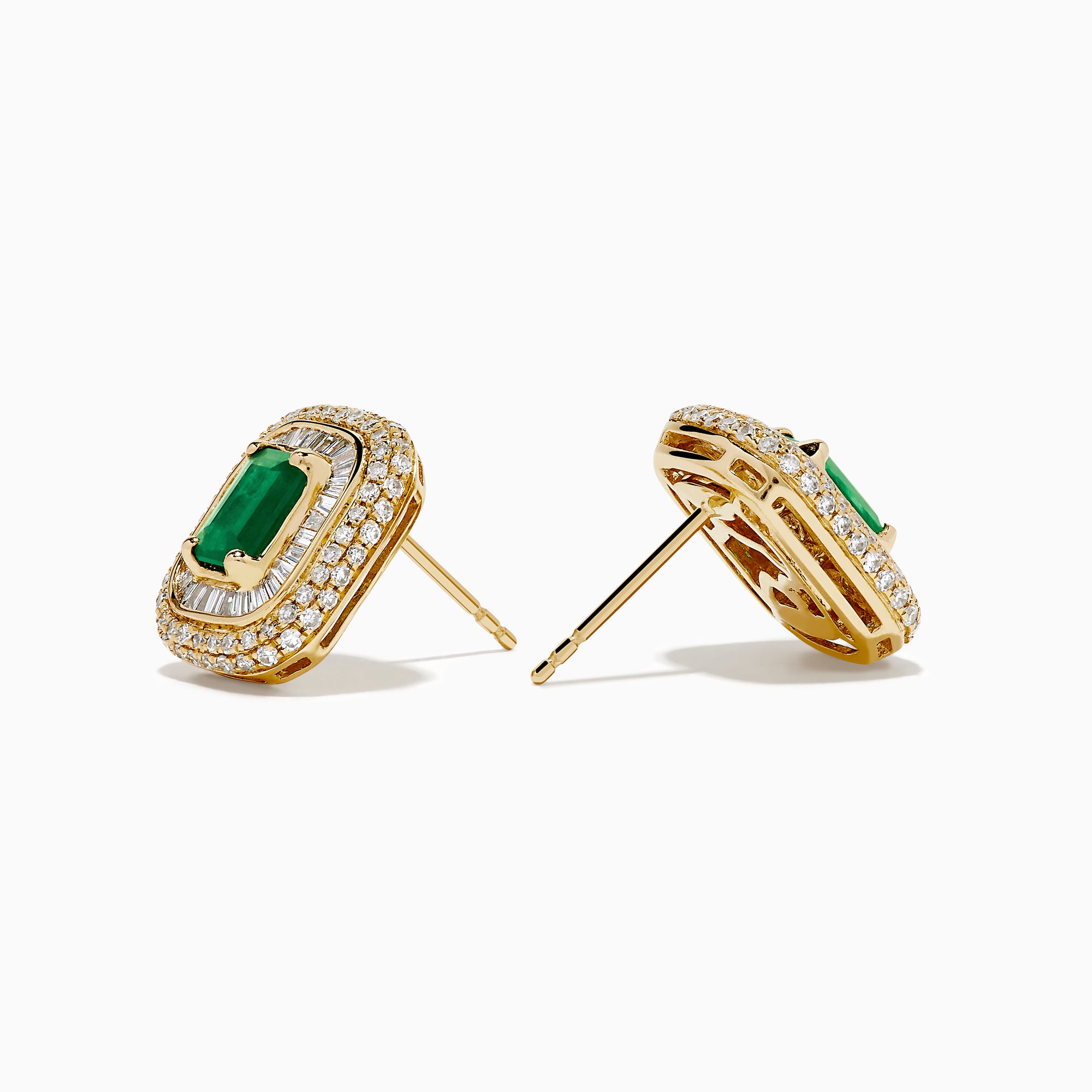The 14K Yellow Gold Emerald and Diamond Double Halo Earrings showcase rectangular green emeralds at the center, framed by two rows of sparkling diamonds in an ornate design.