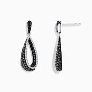 These 14K White Gold Black and White Diamond Earrings (1.30 TCW) feature elegant interlocking teardrop shapes adorned with sparkling diamond accents.
