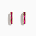 The Ruby Royale 14K Rose Gold Hoop Earrings feature a central row of rubies bordered by diamonds (0.55 TCW), elegantly displayed on a white background.