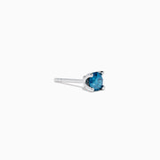 The 14K White Gold Blue Diamond Stud Earrings feature round blue diamonds set in white gold prongs, shown on a white background.