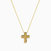The 14K Yellow Gold Cross Pendant is a polished cross pendant necklace displayed on a plain white background.