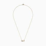 14K Yellow Gold Diamond Accented Infinity Necklace featuring an infinity symbol pendant with diamond accents, displayed against a white background.