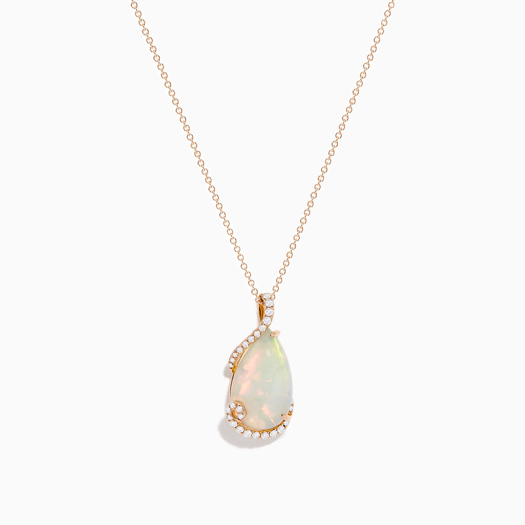 The Aurora 14K Rose Gold Opal and Diamond Pendant features a teardrop-shaped opal accented by a delicate swirl of sparkling diamonds, hanging from a fine gold chain against a plain white background.
