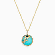 The Seaside 14K Gold Amazonite and Diamond Dolphins Pendant features a round amazonite with diamond accents and dolphin motifs on a delicate gold chain, displayed against a white background.