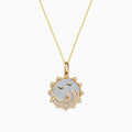 The Seaside 14K Yellow Gold Mother Of Pearl and Diamond Bird and Sea Pendant features a sun-inspired design with bird silhouettes, wave accents with diamonds, a mother-of-pearl background, and a delicate gold chain.