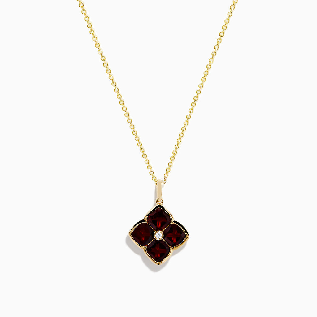 The 14K Yellow Gold Garnet and Diamond Pendant features a four-petal flower-shaped garnet with deep red gemstones outlined in yellow gold and a small clear diamond at the center, shown on a white background.