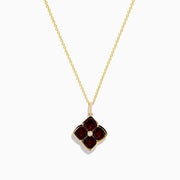 The 14K Yellow Gold Garnet and Diamond Pendant features a four-petal flower-shaped garnet with deep red gemstones outlined in yellow gold and a small clear diamond at the center, shown on a white background.