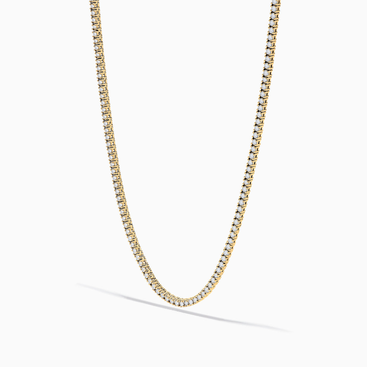 The 14K Yellow Gold Diamond Tennis Necklace, 3.50 TCW, displays a continuous row of white diamonds against a white background with a subtle shadow below.