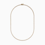 The 14K Yellow Gold Diamond Tennis Necklace, 4.50 TCW, showcases a continuous row of sparkling white stones set in yellow gold and is displayed on a plain white background.
