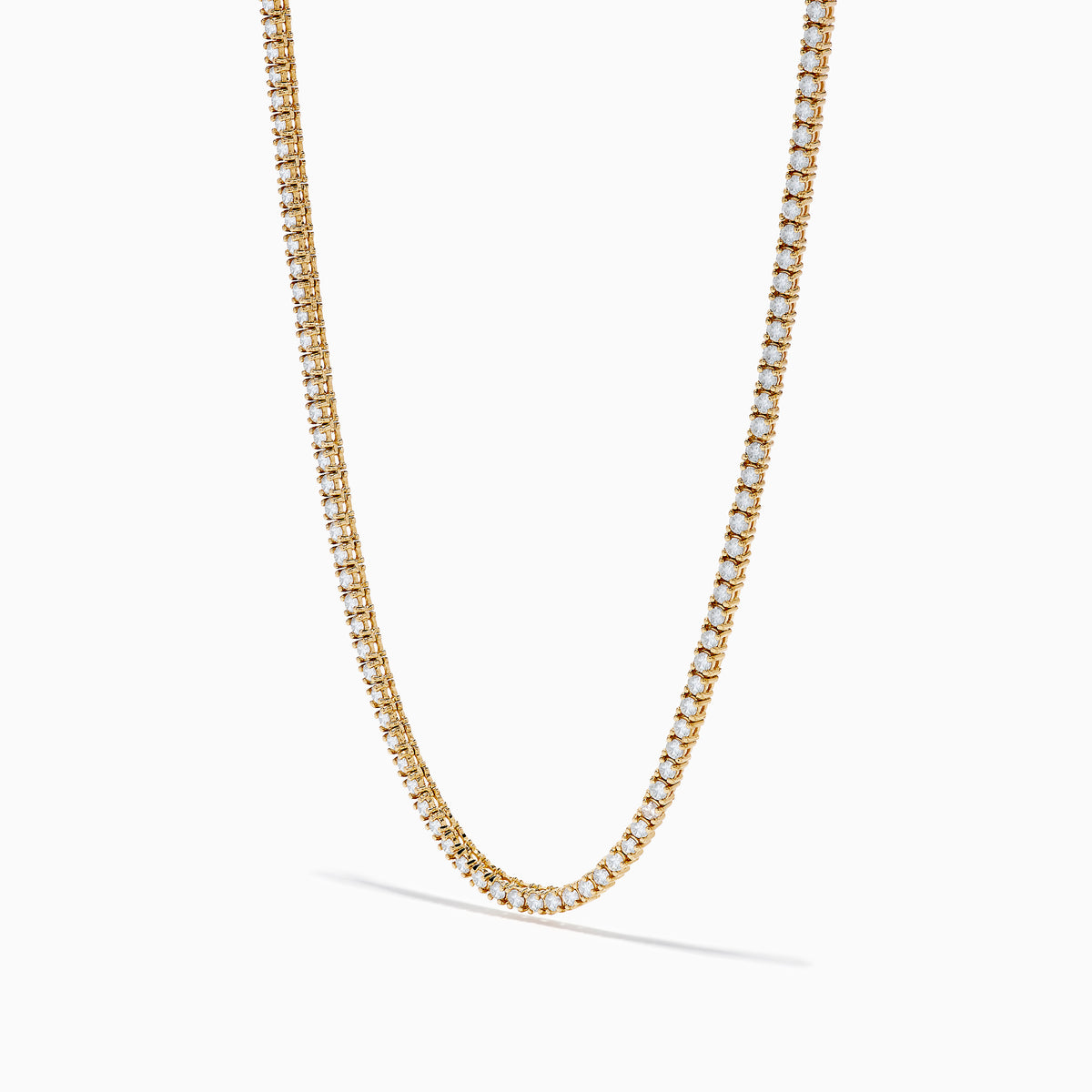 The 14K Yellow Gold Diamond Tennis Necklace, 4.50 TCW, showcases a continuous row of sparkling white stones set in yellow gold and is displayed on a plain white background.