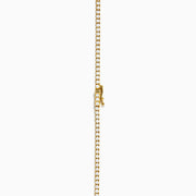 The 14K Yellow Gold Diamond Tennis Necklace, 4.50 TCW, showcases a continuous row of sparkling white stones set in yellow gold and is displayed on a plain white background.
