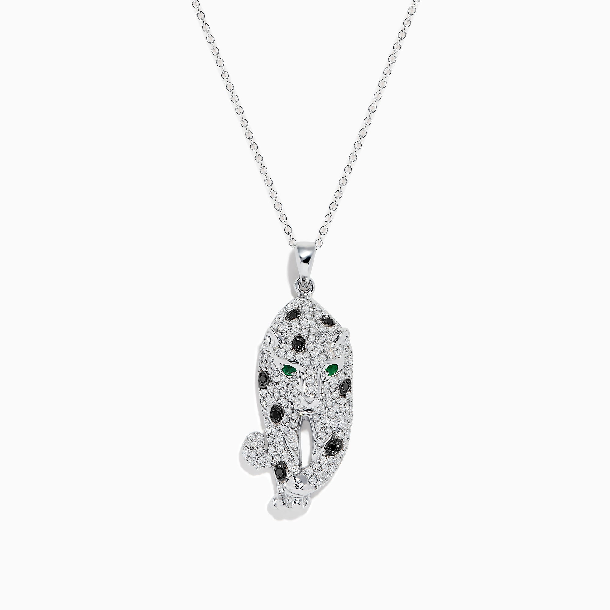 The Signature 14K White Gold Diamond & Emerald Pendant (0.79 TCW) showcases a leopard-shaped design with black spots, green emerald eyes, and diamond accents, elegantly hanging from a delicate chain.