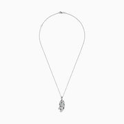 The Signature 14K White Gold Diamond & Emerald Pendant (0.79 TCW) showcases a leopard-shaped design with black spots, green emerald eyes, and diamond accents, elegantly hanging from a delicate chain.