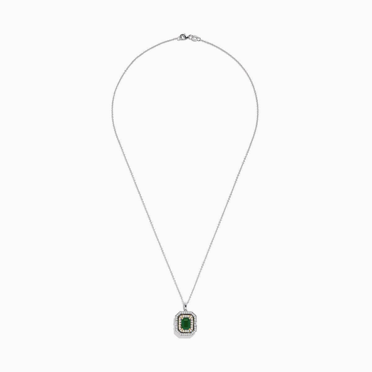 The Brasilica 14K Two Tone Gold Emerald and Diamond Pendant features a rectangular emerald at the center, surrounded by sparkling white and gold diamonds for a total carat weight of 2.09.