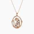 The Signature 14K Rose Gold Diamond and Emerald Pendant, 0.44 TCW, features a sitting leopard with black and white stones, vivid green gemstone eyes, and an oval-shaped gold border for a touch of elegance.