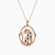 The Signature 14K Rose Gold Diamond and Emerald Pendant, 0.44 TCW, features a sitting leopard with black and white stones, vivid green gemstone eyes, and an oval-shaped gold border for a touch of elegance.