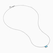 The Lab Grown Blue Diamond Necklace in 14K White Gold features a rectangular emerald-cut lab-grown blue diamond pendant in a simple bezel setting on a delicate white gold chain.