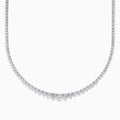 A close-up of the Lab Grown Round Diamond 12.00ct Graduated Tennis Necklace in 14K White Gold, showcasing a continuous row of sparkling lab grown diamonds against a white background.