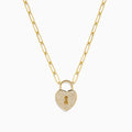 The Novelty 14K Yellow Gold Diamond Heart Lock Pendant is a yellow gold chain necklace with a diamond heart padlock, adorned with sparkling stones and a central keyhole design.