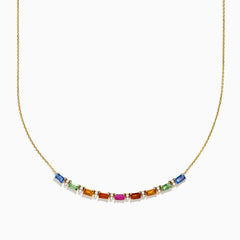 The Watercolors 14K Yellow Gold Multi Sapphire and Diamond Necklace features a delicate gold chain with a gradient row of rectangular multicolored sapphires and diamond accents, displayed on a white background.