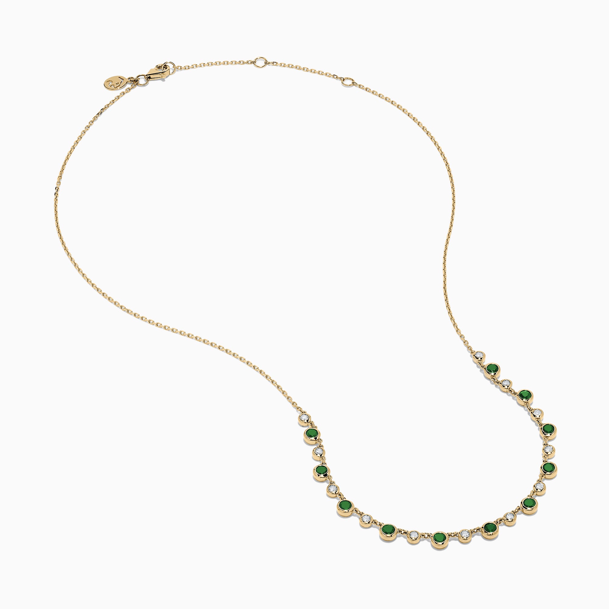 The 14K Yellow Gold Emerald and Diamond Bezel Set Station Necklace features alternating round emeralds and diamonds in bezel settings, evenly spaced along the front curve of the chain, displayed on a white background.