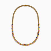The Watercolors 14K Yellow Gold Multi Sapphire Necklace features a repeating pattern of small marquise-shaped sapphires in red, blue, green, orange, and pink set along the entire chain.