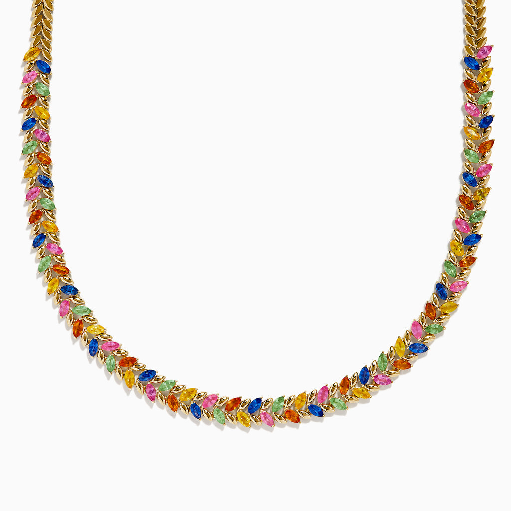 The Watercolors 14K Yellow Gold Multi Sapphire Necklace features a repeating pattern of small marquise-shaped sapphires in red, blue, green, orange, and pink set along the entire chain.