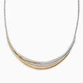 The Trio 14K Tri-Color Gold Diamond Collar Necklace (1.33 TCW) features three curved, layered bands in silver, gold, and rose gold tones, each set with sparkling diamonds on a delicate chain against a white background.