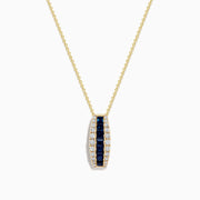 The Royale Bleu 14K Yellow Gold Blue Sapphire and Diamond Pendant features a vertical row of blue sapphires between two rows of diamonds on a delicate gold chain, shown against a white background.