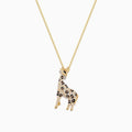 The Safari 14K Yellow Gold Espresso & White Diamond Giraffe Pendant, 0.43 TCW, features black, white, and brown sparkling crystals on a delicate gold chain, shown against a white background.