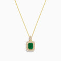 The Brasilica 14K Yellow Gold Emerald and Diamond Pendant showcases a rectangular emerald accented with sparkling diamonds, set against a plain white background.