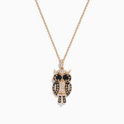 The Safari 14K Rose Gold Owl Pendant features 0.58 TCW brown, black, and white diamonds highlighting its eyes, wings, and body, all hanging from a delicate chain.