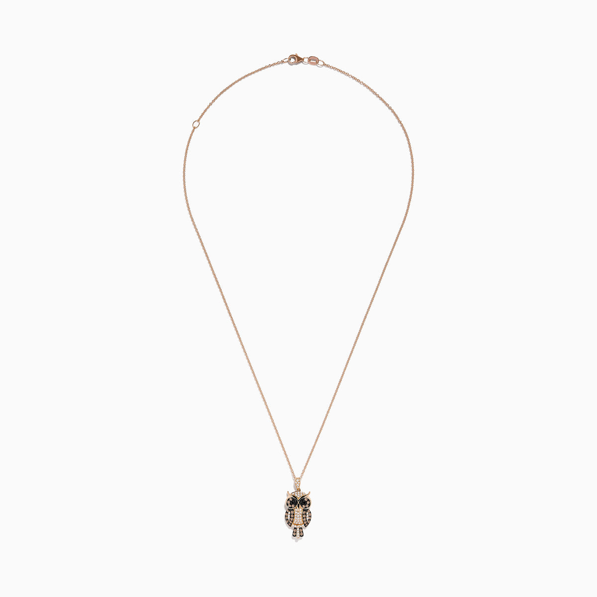 The Safari 14K Rose Gold Owl Pendant features 0.58 TCW brown, black, and white diamonds highlighting its eyes, wings, and body, all hanging from a delicate chain.
