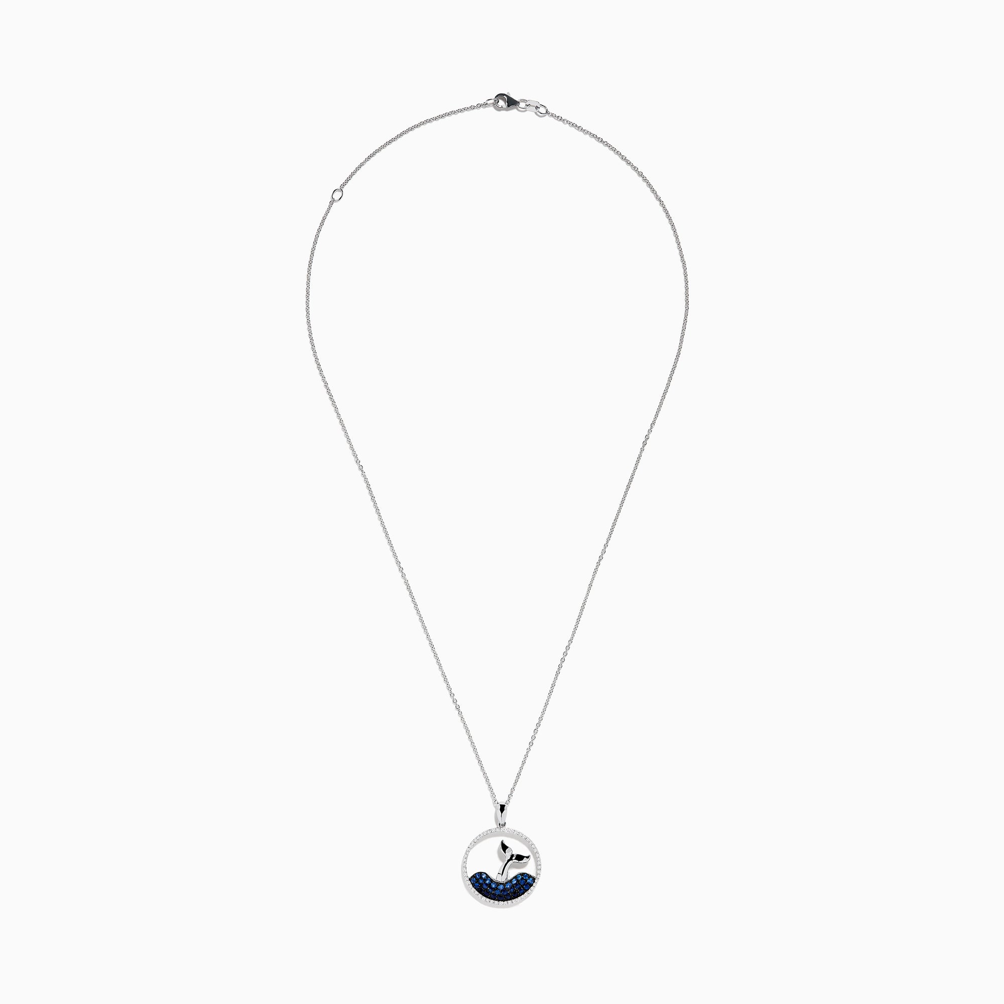 The Seaside 14K White Gold Sapphire and Diamond Whales Tail Pendant features a circular design with a whale tail emerging from sapphire-studded waves, bordered by sparkling diamonds.