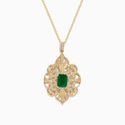 The Brasilica 14K Yellow Gold Emerald & Diamond Filigree Pendant features a large rectangular emerald center, intricate yellow gold detailing, and sparkling diamonds for a total carat weight of 1.62.