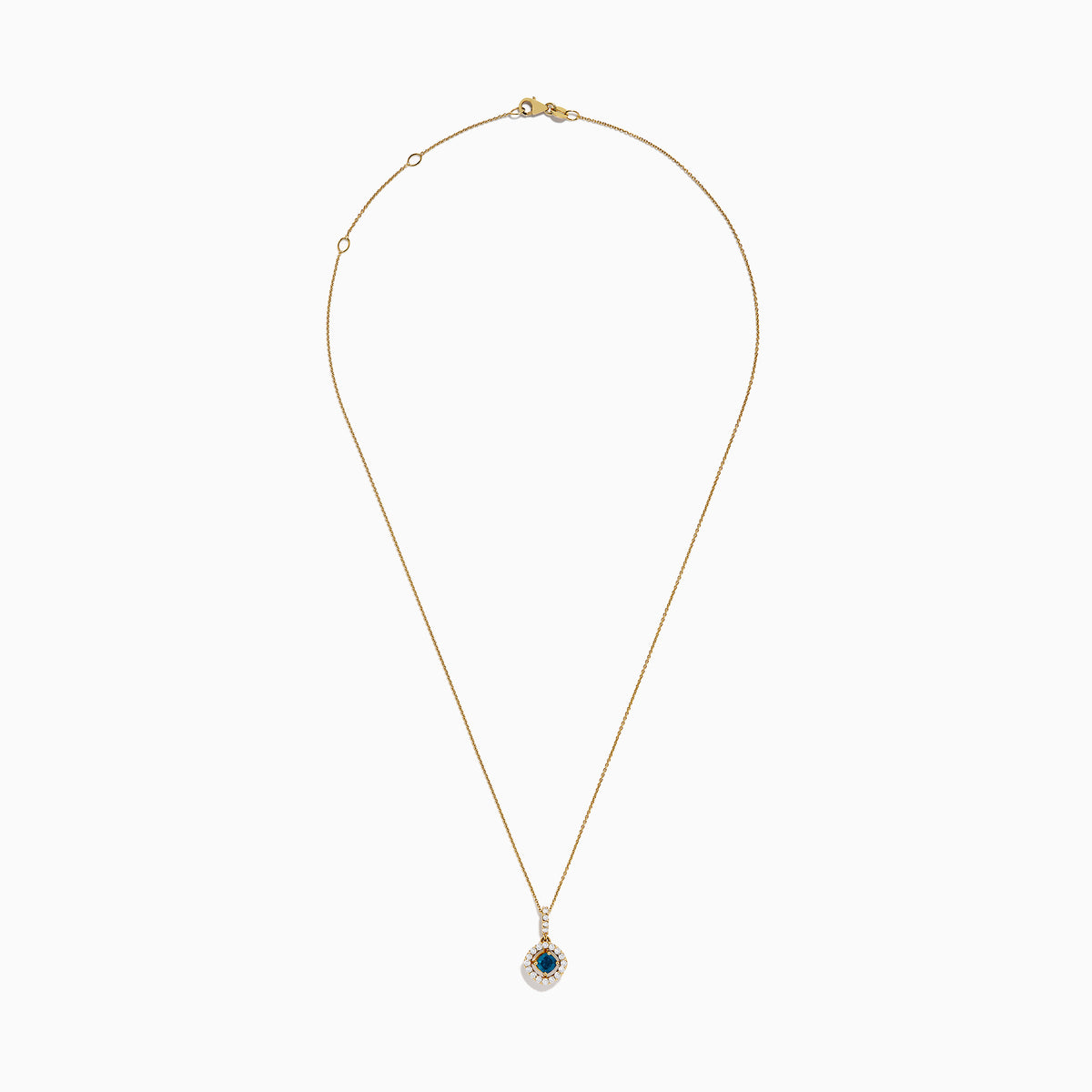 The 14K Yellow Gold Blue and White Diamond Halo Pendant features a round blue gemstone centerpiece surrounded by sparkling white diamonds, all set on a delicate fine chain.
