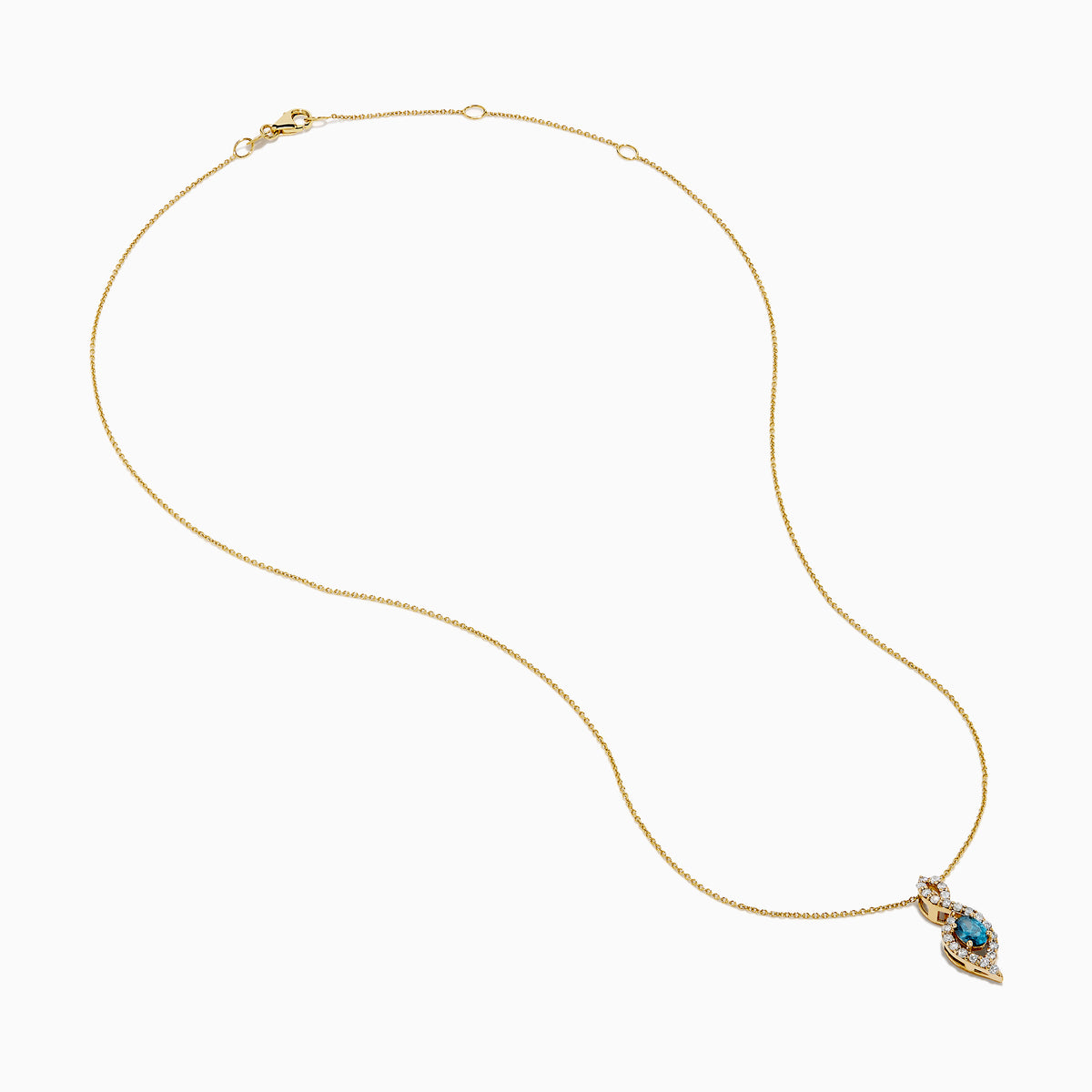 The 14K Yellow Gold Blue and White Diamond S-Curve Halo Pendant features a marquise-shaped blue and white diamond with small white stones in a symmetrical halo on a gold chain necklace.