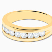 The Mens 14K Yellow Gold 9-Stone Channel Set Diamond Band, 1.00 TCW, features sparkling white diamonds and is shown elegantly on a plain white background.