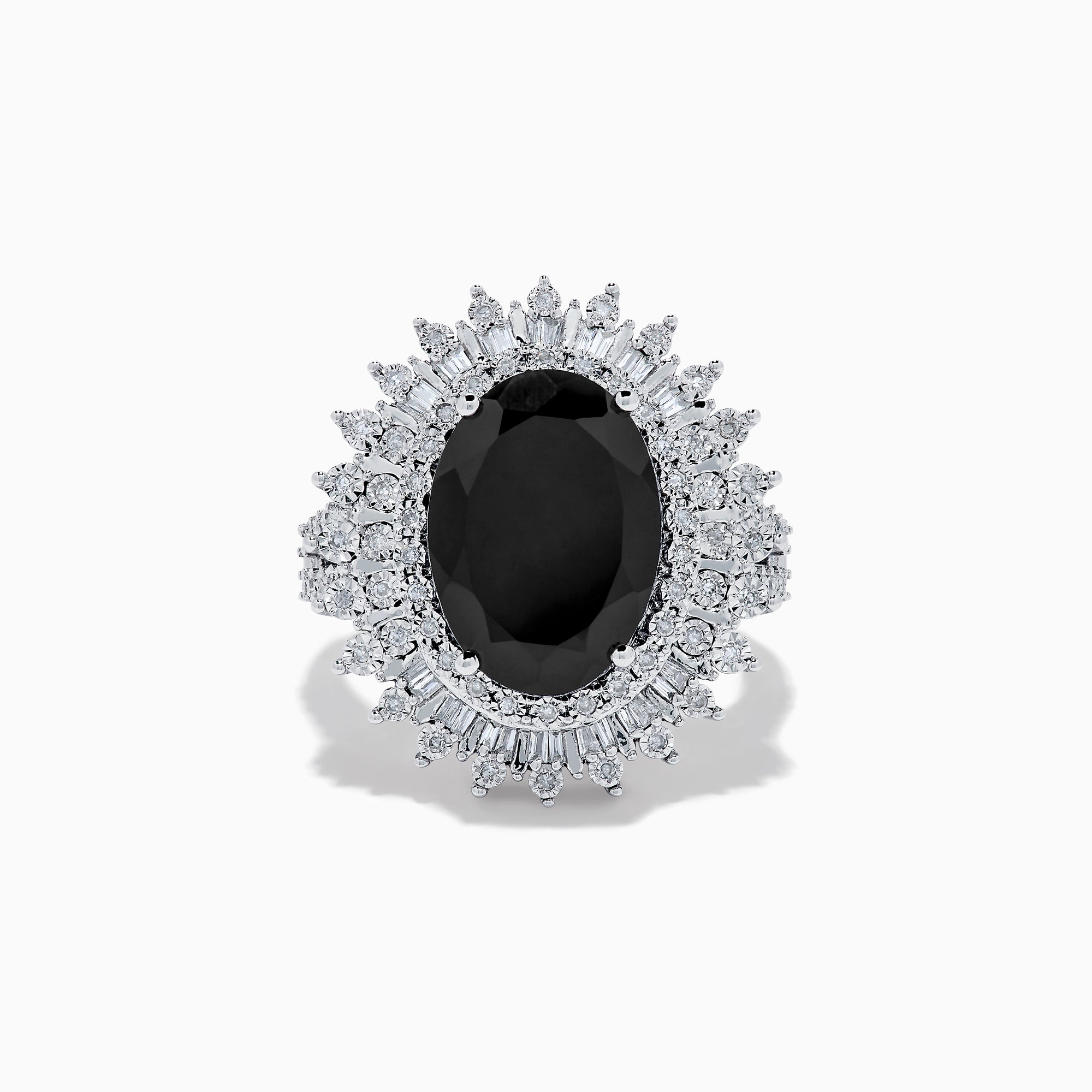 The 14K White Gold Onyx and Diamond Double Halo Ring features a large oval onyx surrounded by two rows of sparkling white diamonds, set on a white gold band and displayed against a white background.