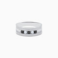 The Mens Sterling Silver Black and White Diamond Ring, 0.50 TCW, features a flat band with alternating black and white diamonds set in a striking central row.