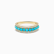 The 14K Yellow Gold Turquoise and Diamond Wedding Band showcases a central row of turquoise beads bordered by sparkling white diamonds, photographed on a white background.