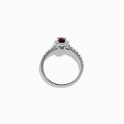 The Effy Hematian 14K White Gold Ring features a cushion-cut alexandrite center stone, surrounded by a diamond halo and additional diamonds set along the band.